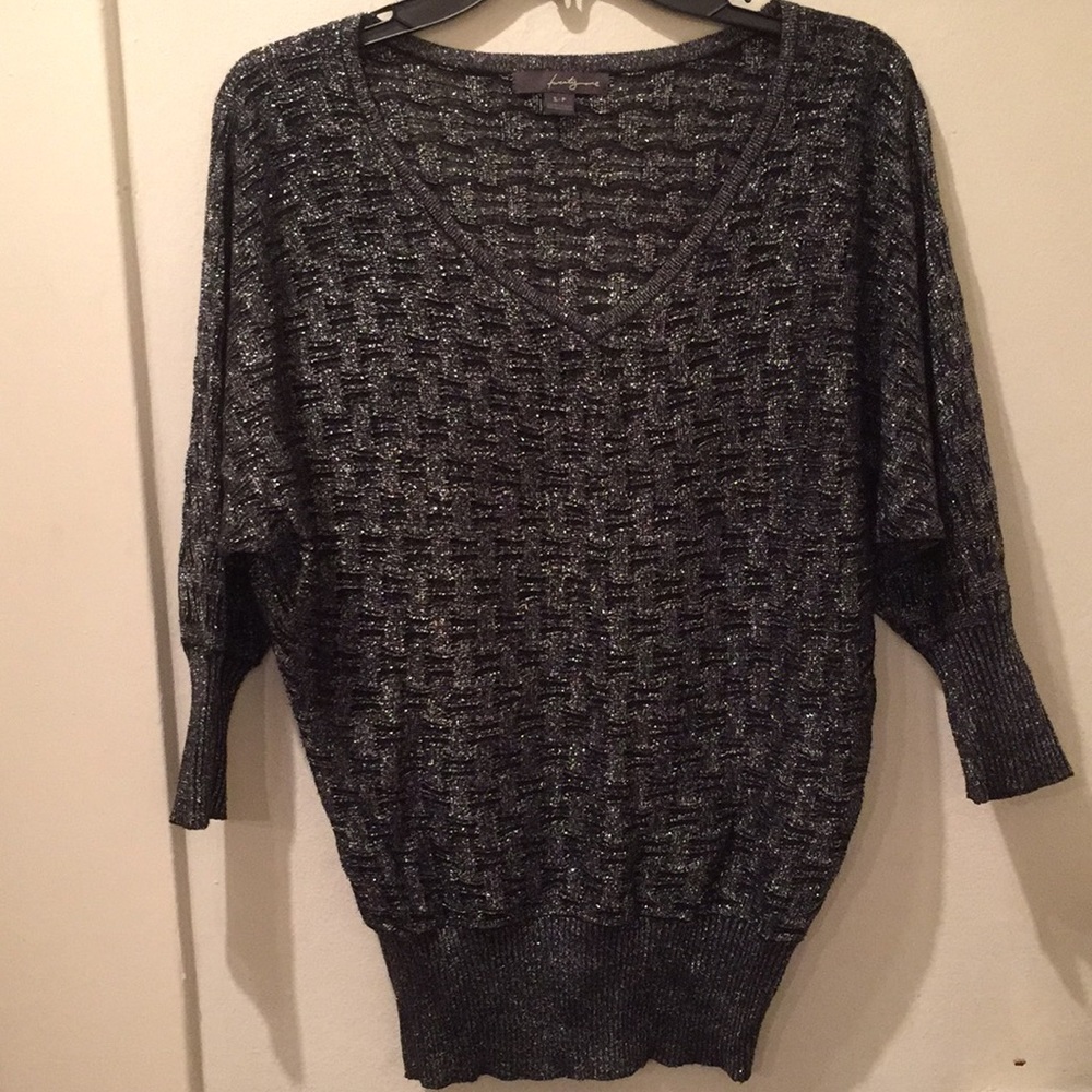 Sparkly, oversized metallic V neck sweater.